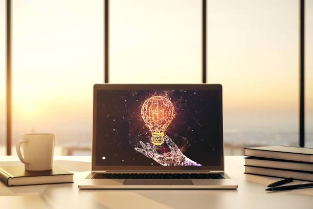 istock Modern computer monitor with creative light bulb hologram, research and development concept. 3D Rendering 1325269329