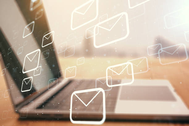 istock Creative abstract postal envelopes sketch on modern laptop background, e-mail and marketing concept. Double exposure 1325269351