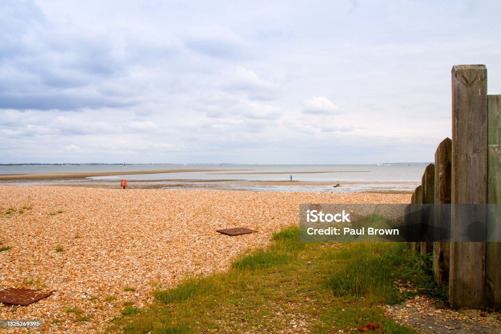 Low tide at Calshot, Hampshire Beach Stock Photo