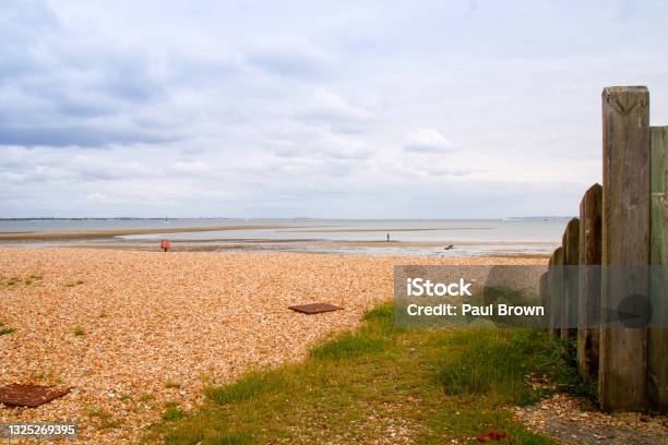 Low Tide At Calshot Hampshire Stock Photo - Download Image Now - Beach, Beauty In Nature, Coastline