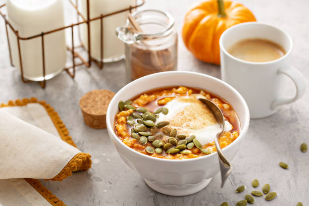 Pumpkin oatmeal with yogurt and pumpkin seeds
