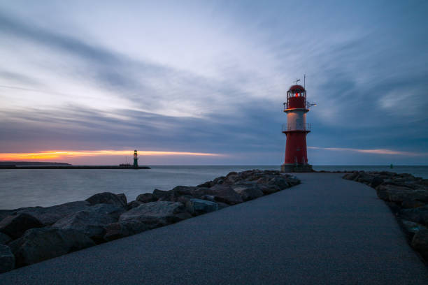 istock Mole on the Baltic Sea coast in Warnemuende, Germany 1325271619