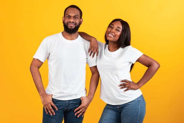 istock African American woman leaning on her man's shoulder at studio 1325276477