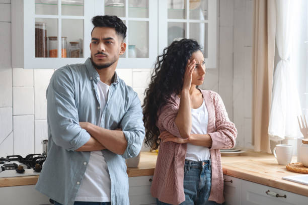 istock Relationship Problems. Upset Arab Couple Ignoring Each Other After Quarrel At Home 1325280689