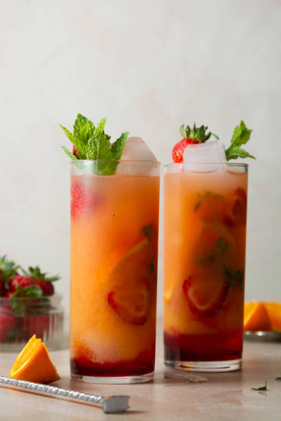 istock Sangria with strawberry, mint and orange in glasses. Summer refreshing fruit drinks 1325282205