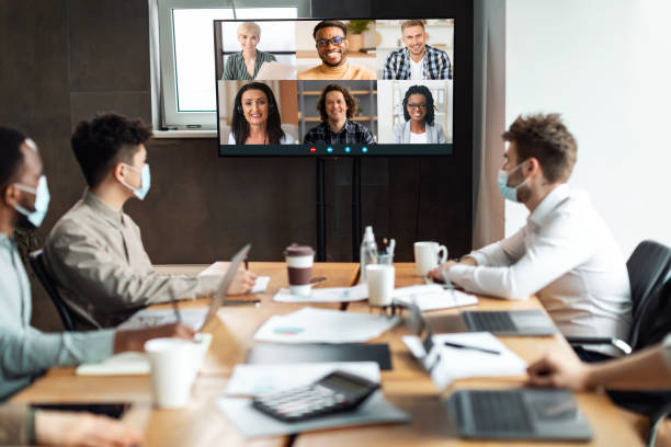 istock Diverse businesspeople making online videocall to employees 1325283050