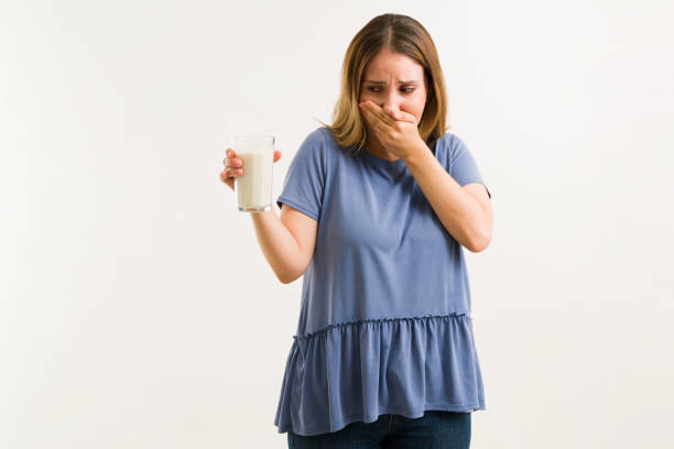 istock Distressed woman does not like milk 1325283197