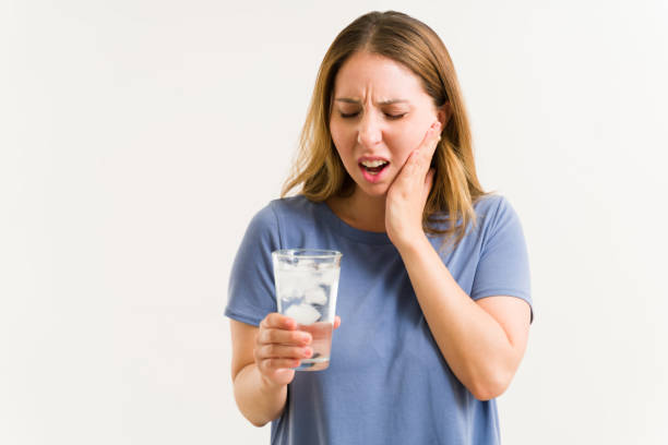 istock Caucasian woman with sensitive teeth 1325286378