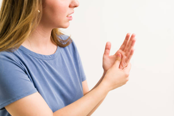 istock Woman in her 20s suffering from carpal tunnel 1325287526