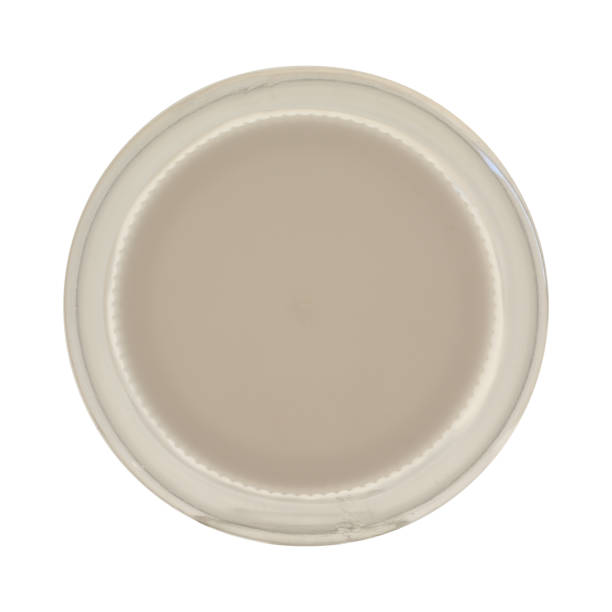 istock Transparent plastic bottle, closed with a lid. Isolated on a white background, top view. 1325288416