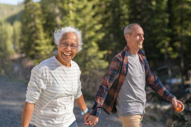 istock Active senior couple walking in nature 1325292439