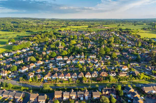 Aerial view of Walton On The Hill, a typical English village in summer sunlight, Staffordshire, England, UK
