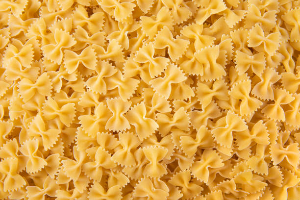 istock Italian Pasta Farfalle Seamless Background 1325293558