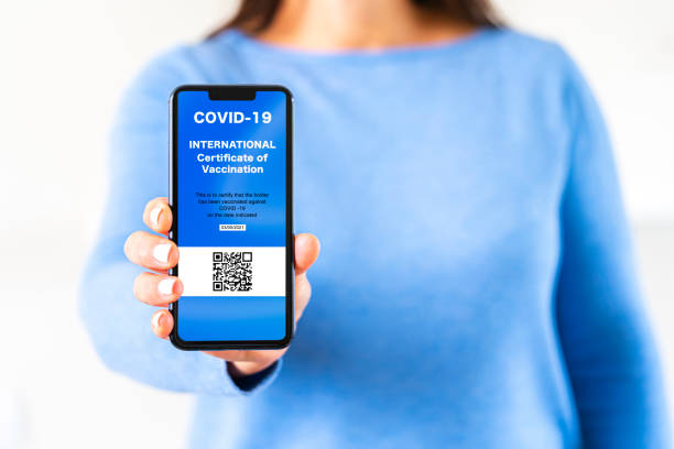 istock Certificate of COVID-19 vaccination on smartphone 1325299736