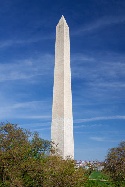 istock Washington Monument with Morning Blue Sky and Clouds, Washington DC, USA. 1325303091