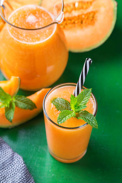 istock Fresh organic melon cantaloupe smoothie on a kitchen table 1325304228