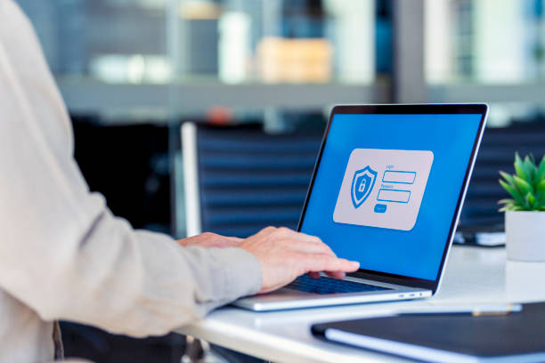 Businessman logging on to a password protected website Businessman logging on to a password protected website. There are login and password fields and a sign in button. There is also a shield and lock graphic log on stock pictures, royalty-free photos & images