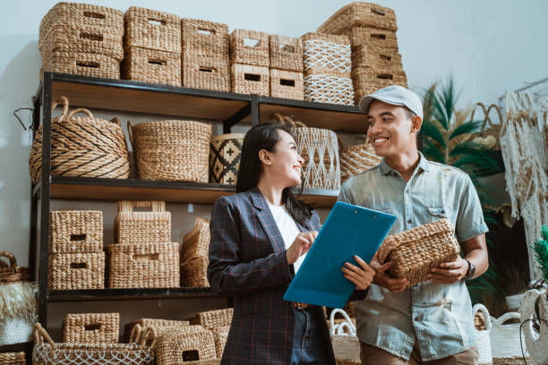 istock Asian woman and man stare at each other while listing items 1325311072