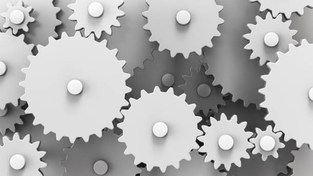 istock Gear mechanism close up. Many connected cogwheels. 1325311946