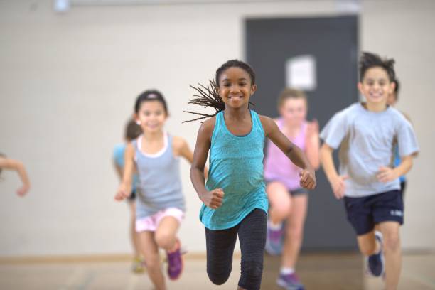 istock Group of children running during a physical education class 1325313665