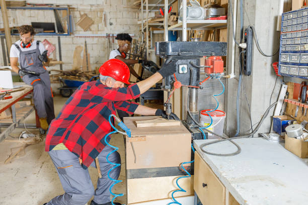 istock A Small Group of Carpenters of Different Ethnicities are Working in Workshop. 1325315208
