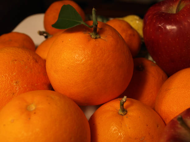 istock Oranges and apples in a fruit bowl 1325316878