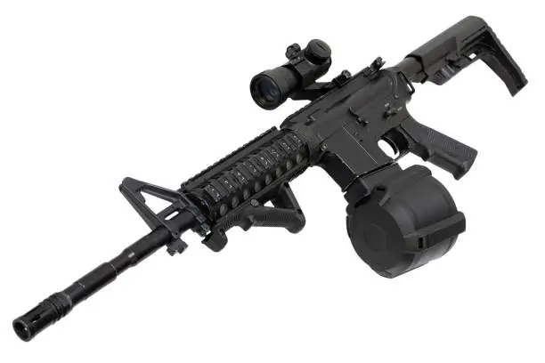 Photo of M4 assault rifle with optic scope and drum magazine