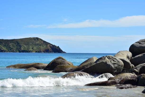 istock Coastal Boulders Washed By Surf 1325320734