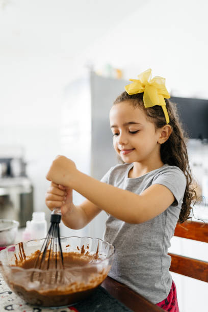 istock Girl prepared a chocolate cake 1325323859