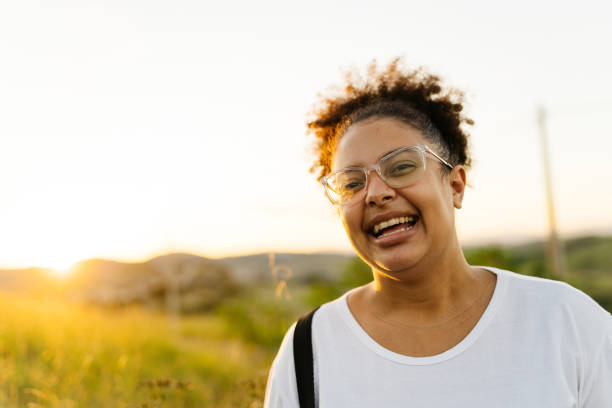 istock Woman smiling outdoor 1325324595