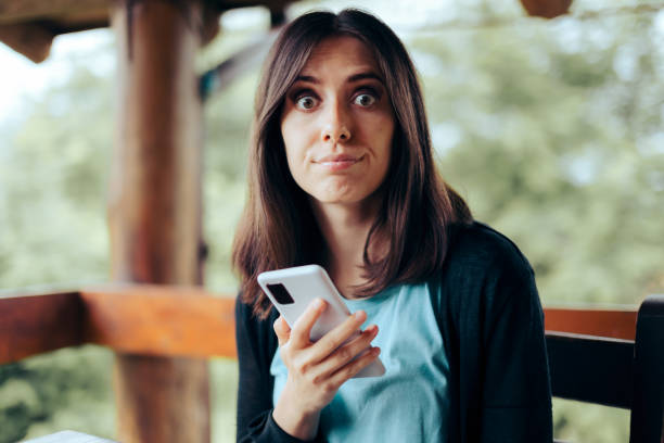 istock Woman Reacting to an Awkward Text Message 1325324738