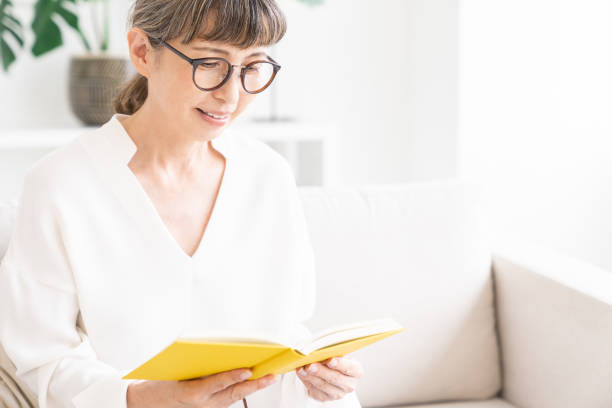 istock senior age woman who reads a book 1325325496
