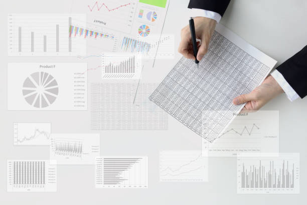 istock Business man's hand analyzing with various charts and graphs 1325327463