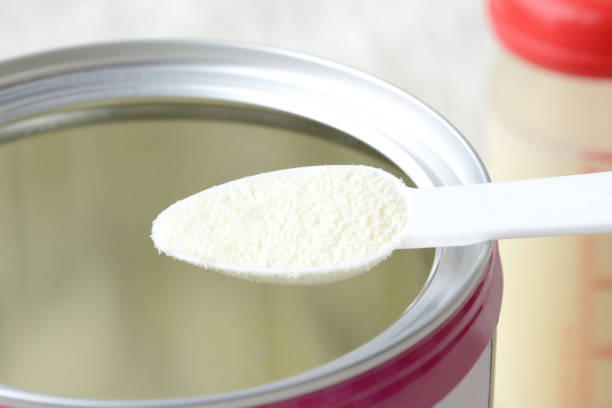 istock One spoon of powder for formula 1325328015