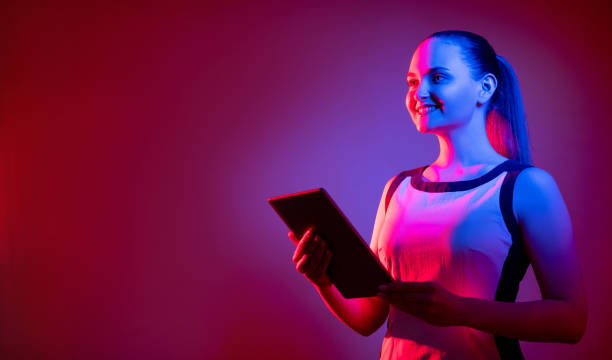 istock digital coaching futuristic technology neon woman 1325328326