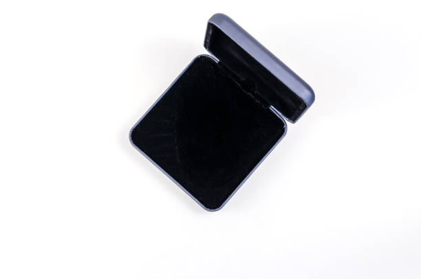 Open Small Square plastic gift box on white background. Blue box for packing engagement rings, earrings, cufflinks