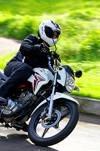 campinas, sao paulo / brazil - july 31, 2013: motorcyclists are seen during test drive with motorcycles models CG Titan 150 EX from Honda manufacturer in the city of Campinas.