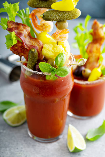 istock Bloody mary cocktail topped with various garnishes 1325335481