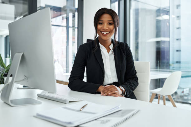 istock Shot of a young businesswoman using a computer in a modern office 1325337681