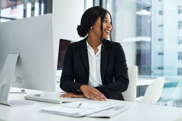 istock Shot of a young businesswoman using a computer in a modern office 1325337701