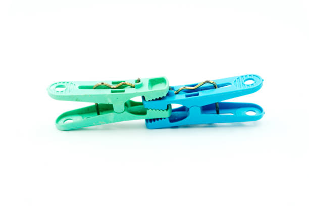 istock Blue and Green plastic clothespin. 1325339908