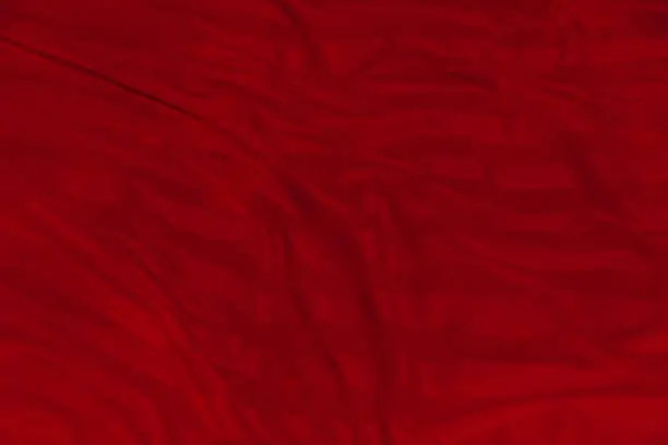 Photo of red fabric texture for background,copy space for design.