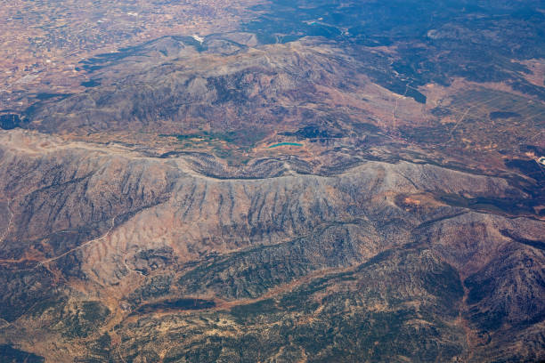 istock mountain landscape view from the airplane window, horizontal, 1325348647