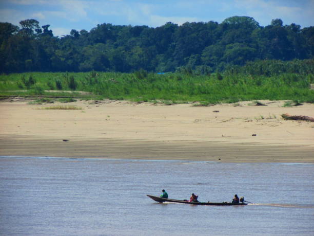 istock People and the boat, Ucayali River, Amazonas, Peru. Jungle 1325349372