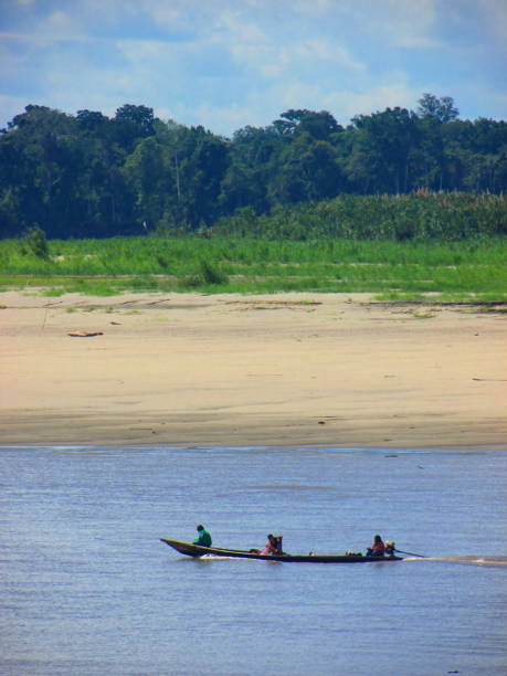 istock People and the boat, Ucayali River, Amazonas, Peru. Jungle 1325349422
