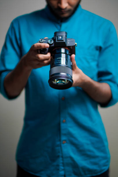 Photographer With Camera on white background.
