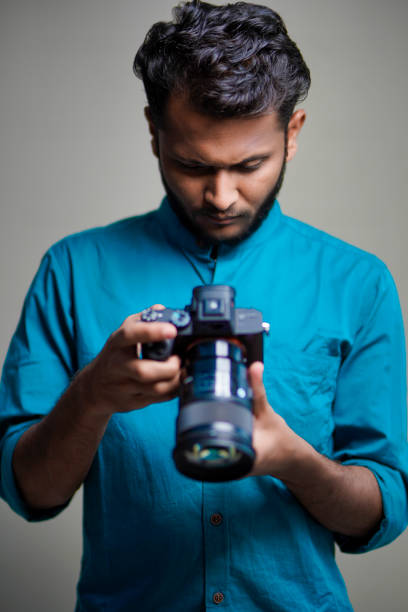 istock Photographer With Camera on white background. 1325350259