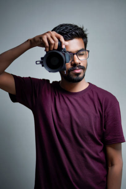istock Photographer With Camera on white background. 1325350287