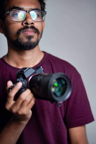 istock Photographer With Camera on white background. 1325350317