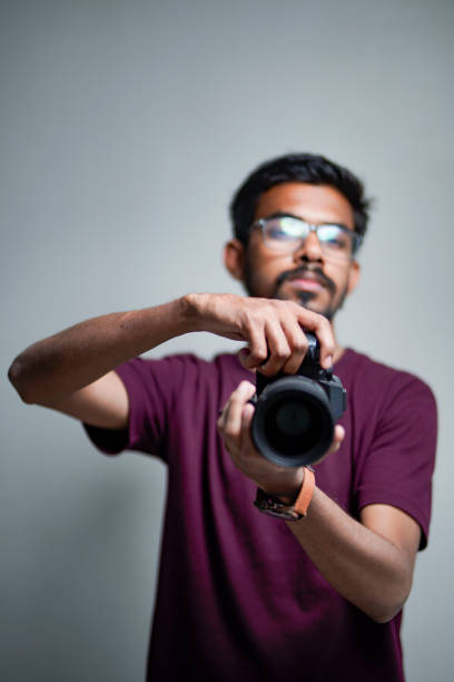 istock Photographer With Camera on white background. 1325350330